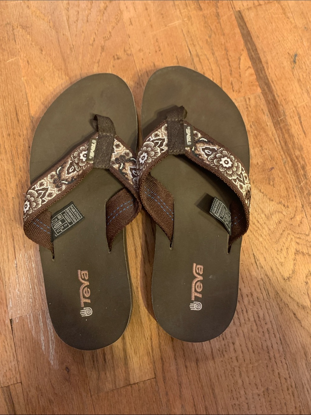 Brown Teva flip flops 7